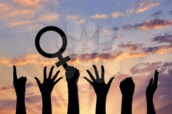 Silhouette of hand movements feminists holding the symbol of Venus mirror. feminist concept