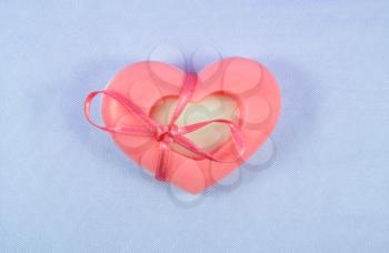 Handmade soap in the package in the form of heart
