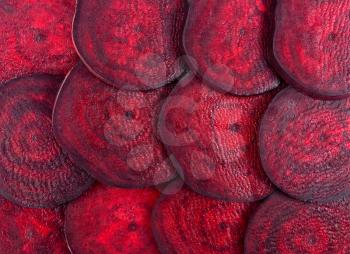Slices of beet discs close-up texture
