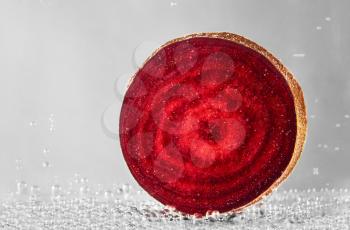 Cut beets in water . design element