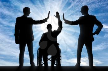 Disabled worker. Silhouette of a disabled man in a wheelchair and her two colleagues make a hand gesture, give five