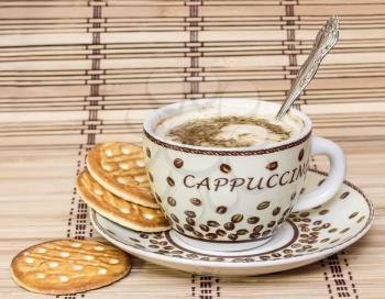 Beautiful background with a coffee Cup and biscuits.