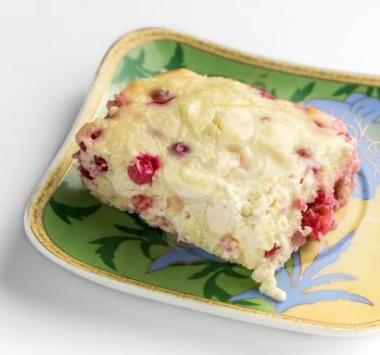 Appetizing cottage cheese casserole with red currant berries.