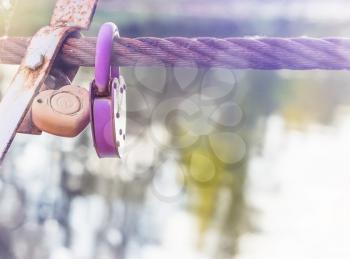 Romantic photo with two locks closed and bokeh.
