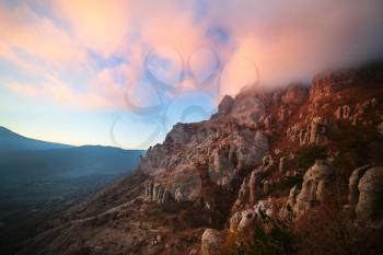 Colorful sunset over the mountain hills. Autumn in the Crimean mountains, Demerji