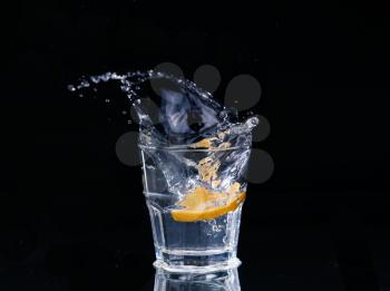 water on a glass on dark background.