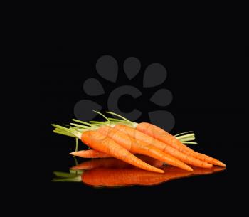 carrots on black slate background