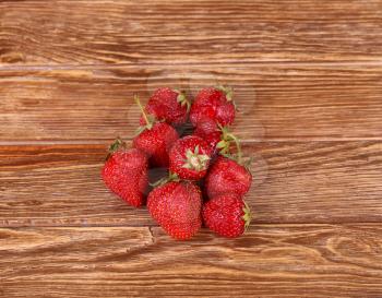 Ripe strawberries, isolated on wooden background. Top View