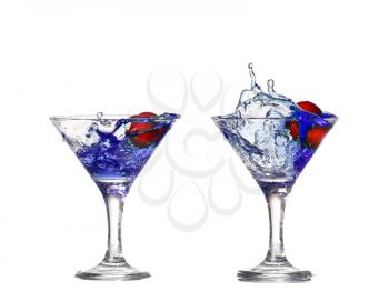 collage blue cocktail with cherry splash on white