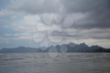 Rocks on the horizon, the coast of Thailand. Before the storm