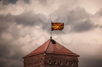 Flag with original proportions. Closeup of grunge flag of Macedonia