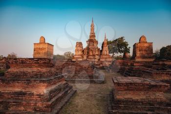 Sukhothai Historical Park, a UNESCO World Heritage Site in Thailand. cultural heritage at sunset, beautiful golden light and the remnants of past eras