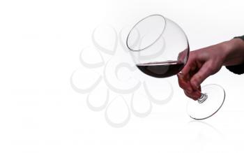 male hand holds a glass with red wine isolated on white background