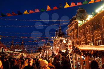 Moscow, Russia, 10 January 2020: Celebration of the New Year and Christmas in the center of Moscow. New Year and Christmas fair on Manezhnaya Square, happy people and actors.