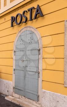 Closed door to Posta or post office in Castle District in Buda, Budapest, Hungary