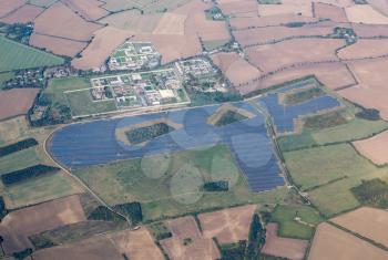 Large solar panel array in fields around Highpoint Prison near Newmarket, England, UK