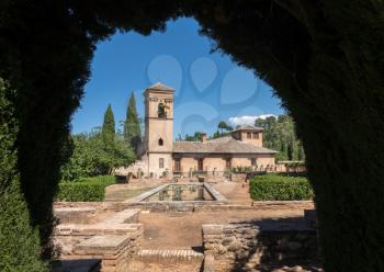 Gardens and Parador hotel in Alhambra palace in ancient city of Granada in Andalucia, Spain, Europe