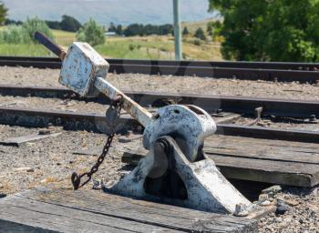 Heavy duty points lever by railway track of Taieri Gorge tourist railway