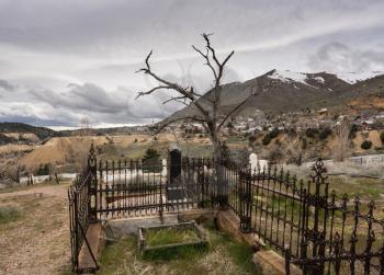Old tombs and graves overlook the old town of Virginia City in Nevada, a center for gold and silver mining in the past