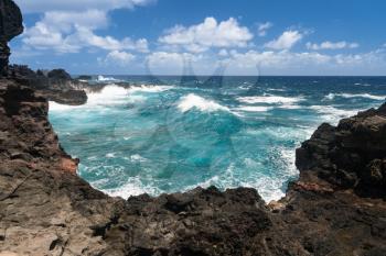 Rugged and beautiful Olivine pools on coastline around north east of Hawaiian island of Maui on Kahekili highway