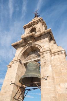 Large brass bell at the top of the church tower of the Cathedral in Valencia