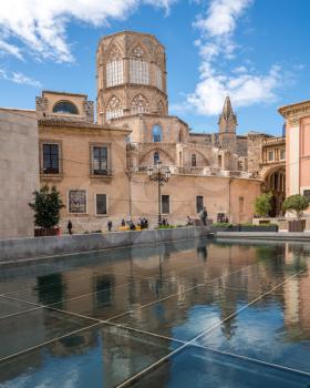 VALENCIA, SPAIN - MARCH 16, 2018: Cathedral and Basilica with reflection in Valencia in Spain