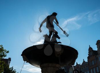 Neptune's Fountain in the market square of Gdansk, Poland. The fountain was designed in 1617