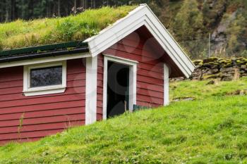 Grass and turf used as roofing material on Norwegian homes and stable