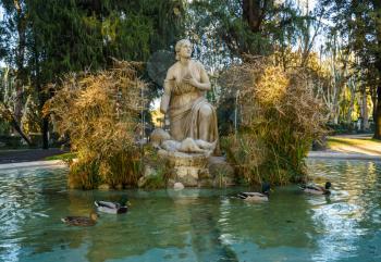 Fountain of Moses showing woman and child in the Borghese Villa Gardens in Rome