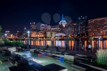 PITTSBURGH, PA - 3 jULY 2018: Downtown Pittsburgh from river trail on North Side at night