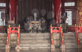 Detail of ornate interior and throne in Temple of Heaven in Beijing, China