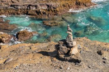 View from Halona Blowhole at rock cairn on cliff side near Waikiki in Oahu