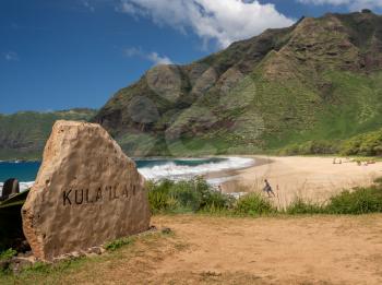 Large waves crash on the shoreline of Kula'ila'i bay and beach on the extreme west coast of Oahu in Hawaii