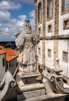 Statue by the Biblioteca Joanina of the University of Coimbra