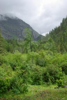 Mountain landscape. Highlands, the mountain peaks, gorges and valleys. The stones on the slopes.