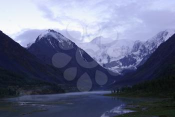 Mountain landscape. Highlands, the mountain peaks, gorges and valleys. The stones on the slopes.