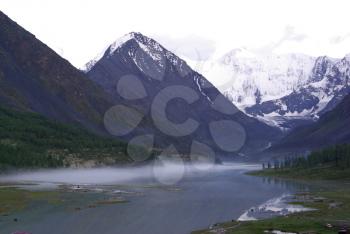 Mountain landscape. Highlands, the mountain peaks, gorges and valleys. The stones on the slopes.