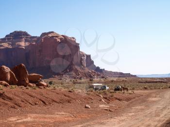 Monument Valley, Arizona, USA - May 12, 2013: Cars on the background Monument Valley.
