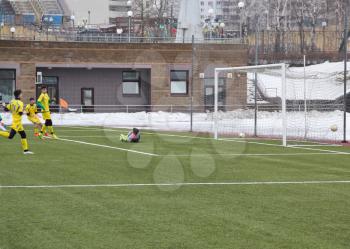 Football game. Training matches junior teams and fans.