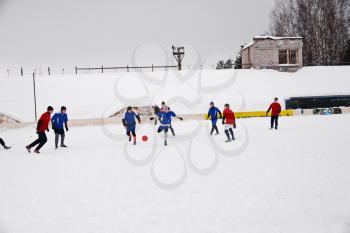 Football game. Training matches junior teams and fans.