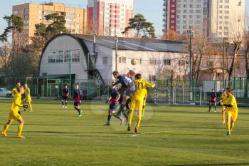 Football game. Training matches junior teams and fans.