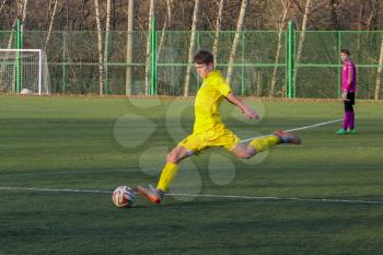 Football game. Training matches junior teams and fans.