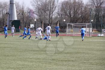 Football game. Training matches junior teams and fans.