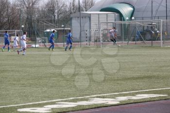 Football game. Training matches junior teams and fans.