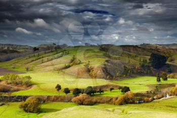 Landscape with farmland and cloudy sky, North Island, New Zealand