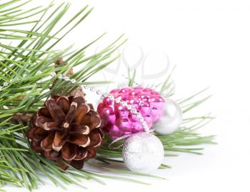 Christmas background with pink decoration and pine branch