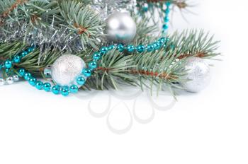 Christmas background with blue bead, decoration and fir branch 