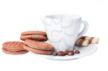 Cup of coffee and chocolate cookies on a white background