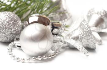 Christmas background with white balls and silver bell