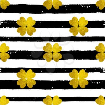 Decorative seamless pattern with black lines and golden clover leaves on a white background. Design for St. Patrick's Day. 